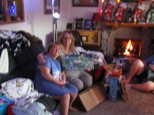 mom and Melissa opening presents